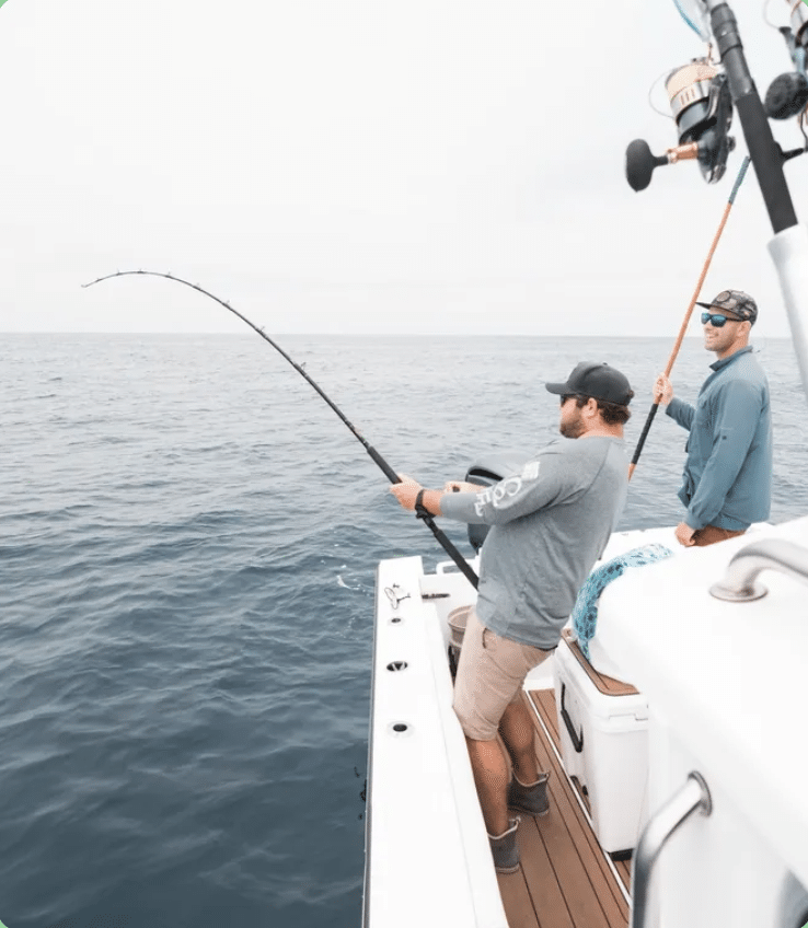 A private fishing charter with man fishing. Coast To Coast Sport Fishing is the best fishing charter in San Diego.